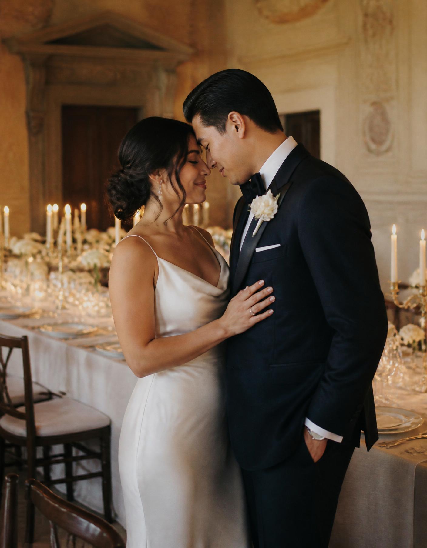 Candlelit editorial tablescape with ivory florals